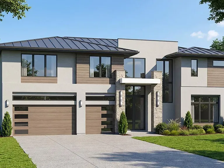 Concrete driveway leading toward a modern house and garage
